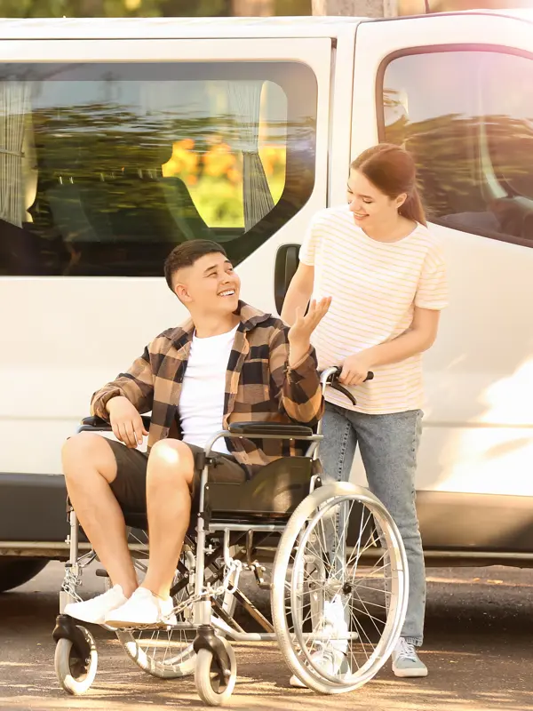 Wheelchair in front of white van